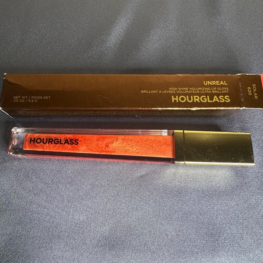 Hourglass Unreal Volumizing Lip Gloss in Bold Red